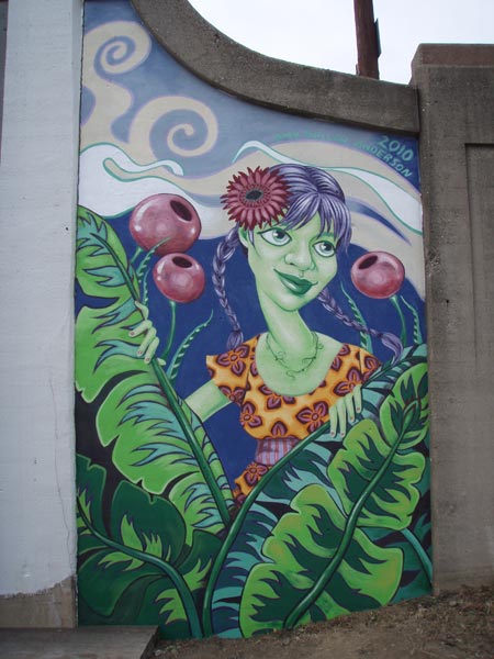 Brightened her skin to separate it more from the leaves.