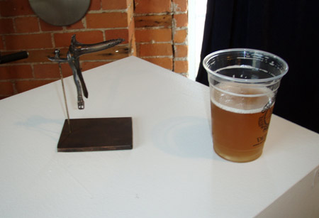 Someone, NOT US, used the H.R. Giger ped as a resting spot for his beer, but we thought it was a perfect opportunity to show the scale of the piece.
