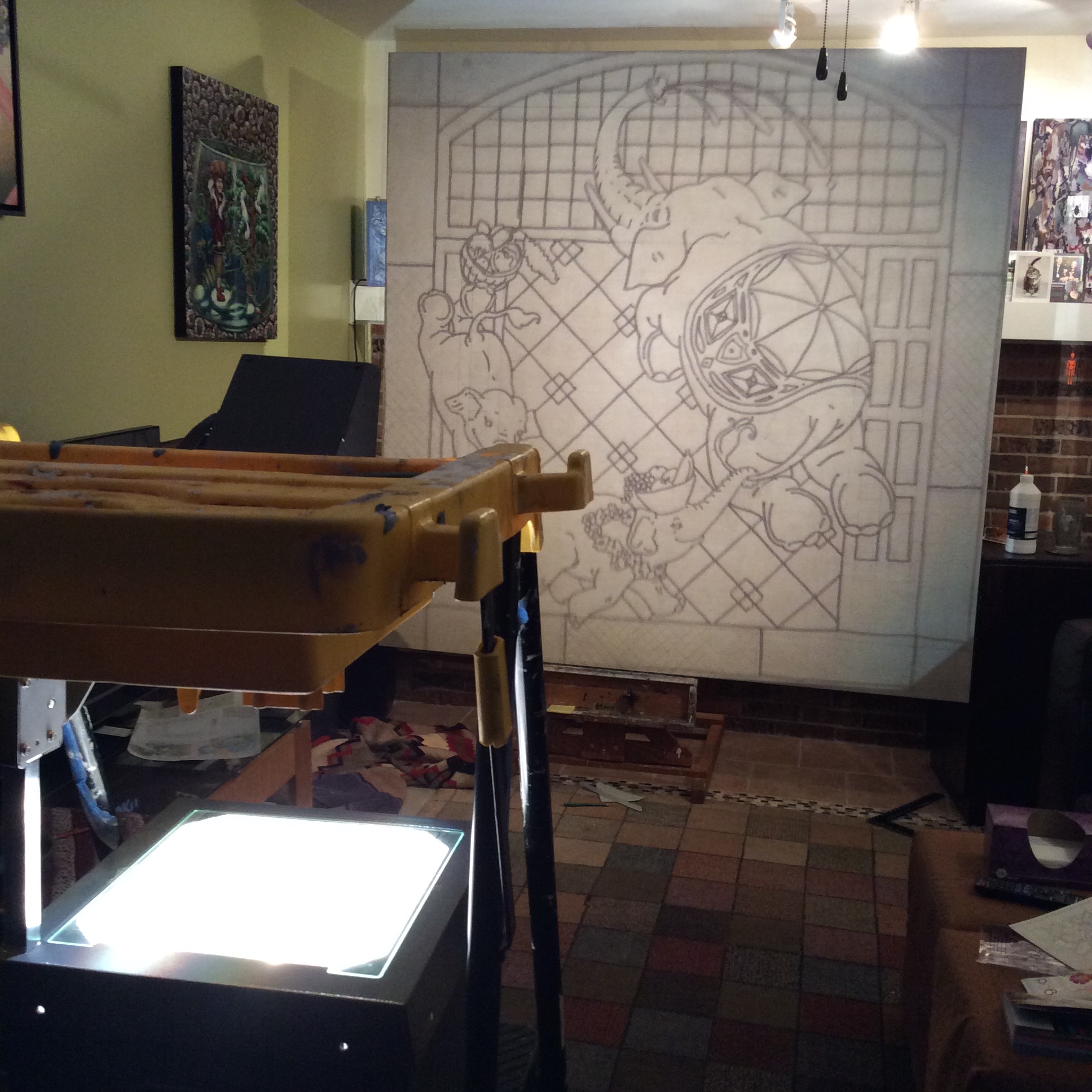 Using a sheet of acetate, I traced the scale images so I could project them to the canvas. This technique was perfect for the main image, but does not seem to be effective for the smaller repeating border elements. 