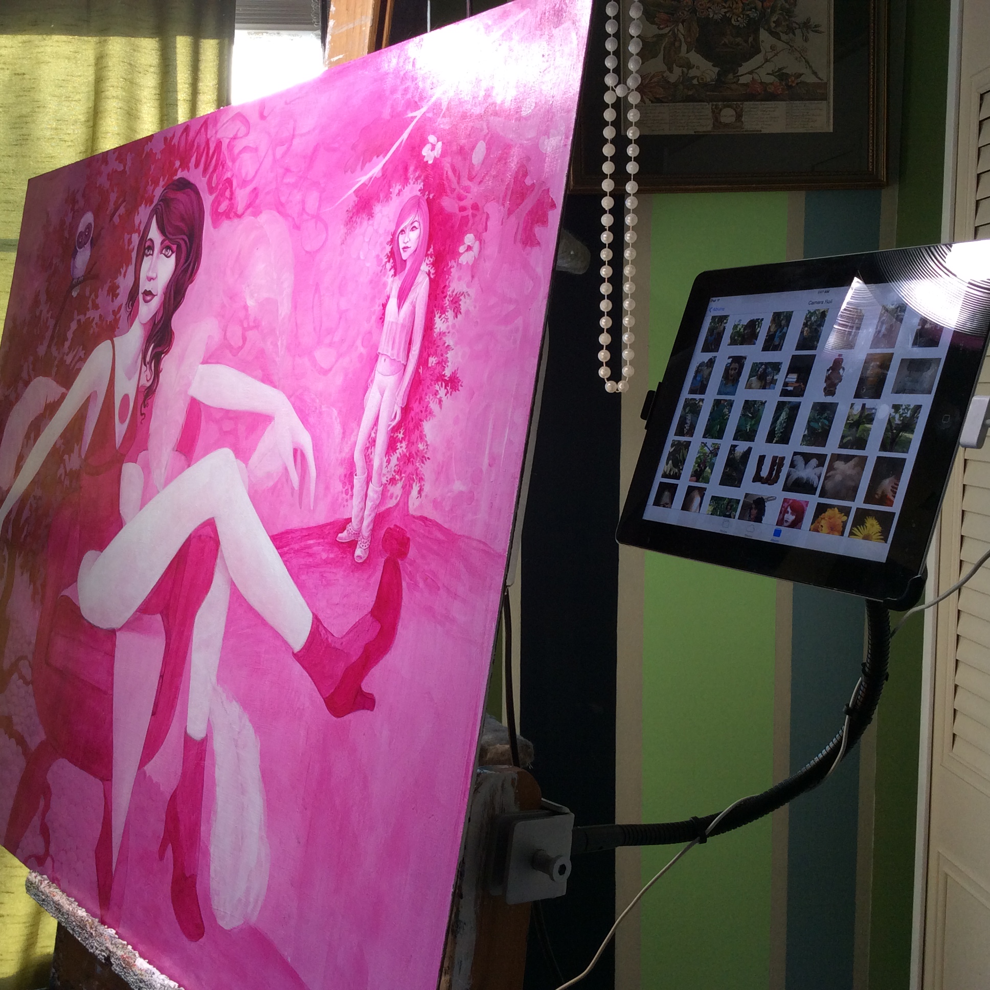 My studio easel with iPad photo reference center, photo taken with my Mini. 