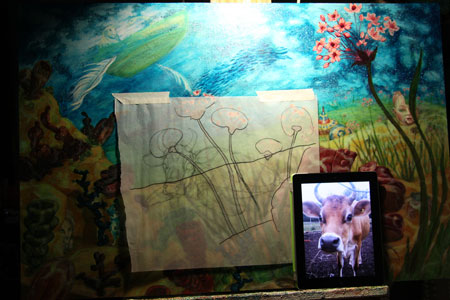 I felt like the composition was lacking, so I am adding in a Mock Turtle (cow) using tracing paper to see the placement. 