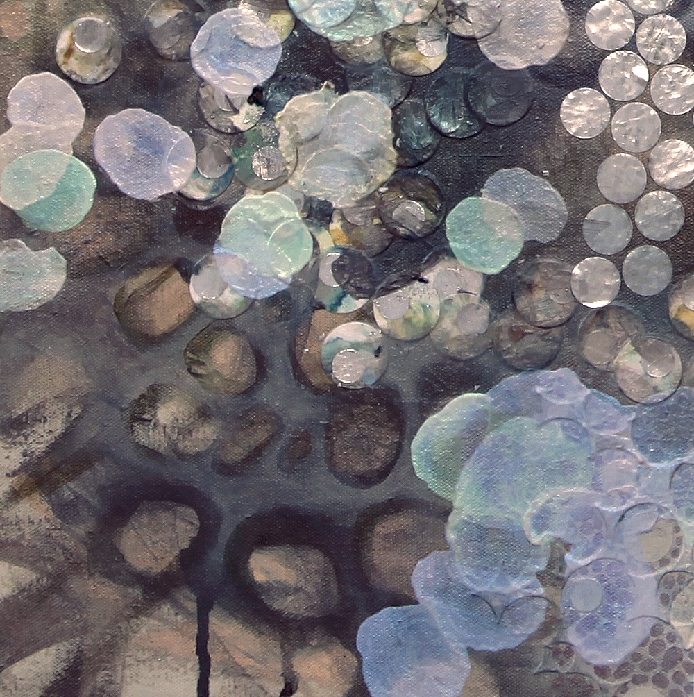 Area of dark pebbles with interference paint. 
