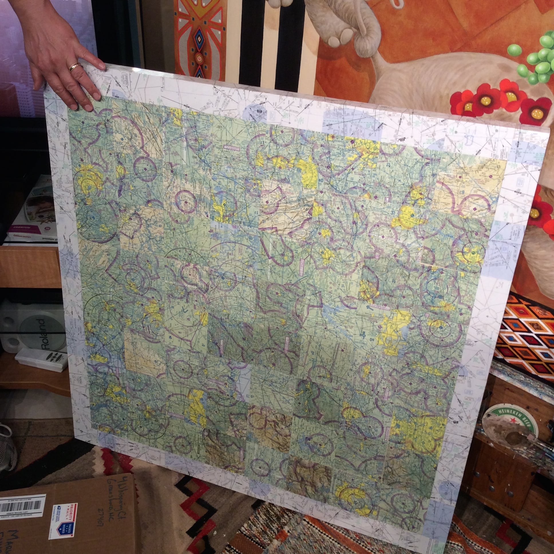 Ari approves the use of his old flight maps.