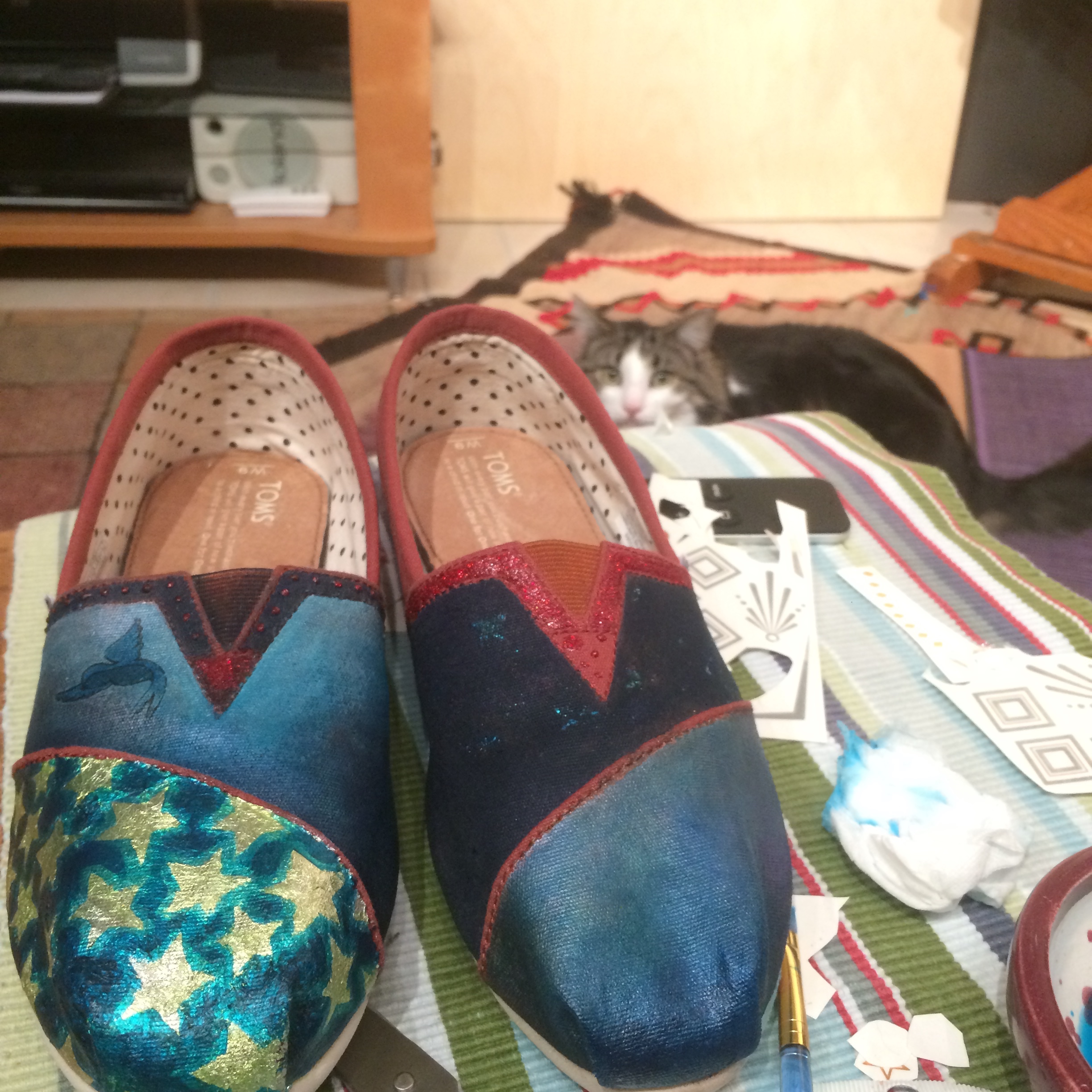 Some glazes of blue and an attempt at temporary tattoo metallic stars. 