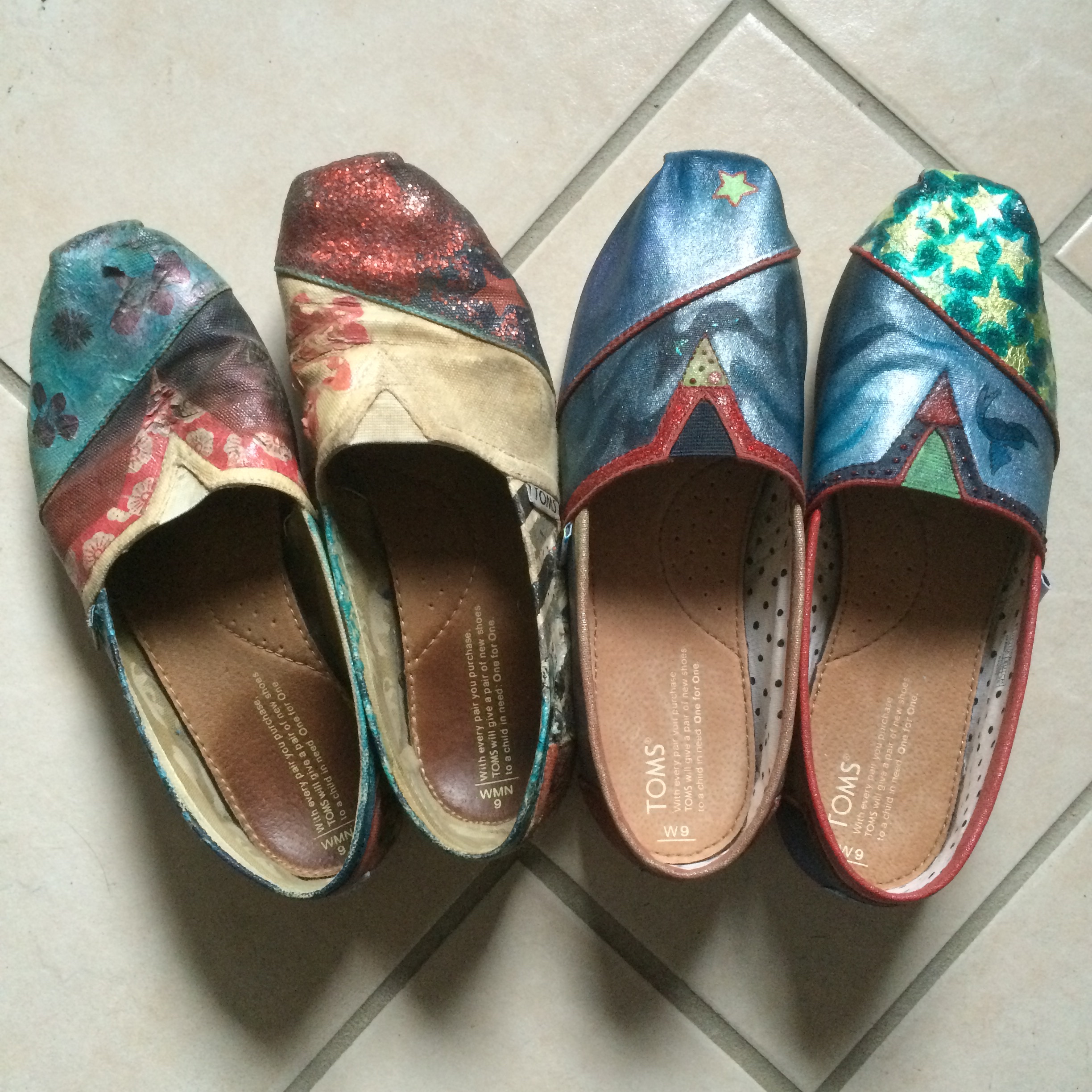 My old pair, featuring tissue paper and chunky glitter, next to my finished new pair. 