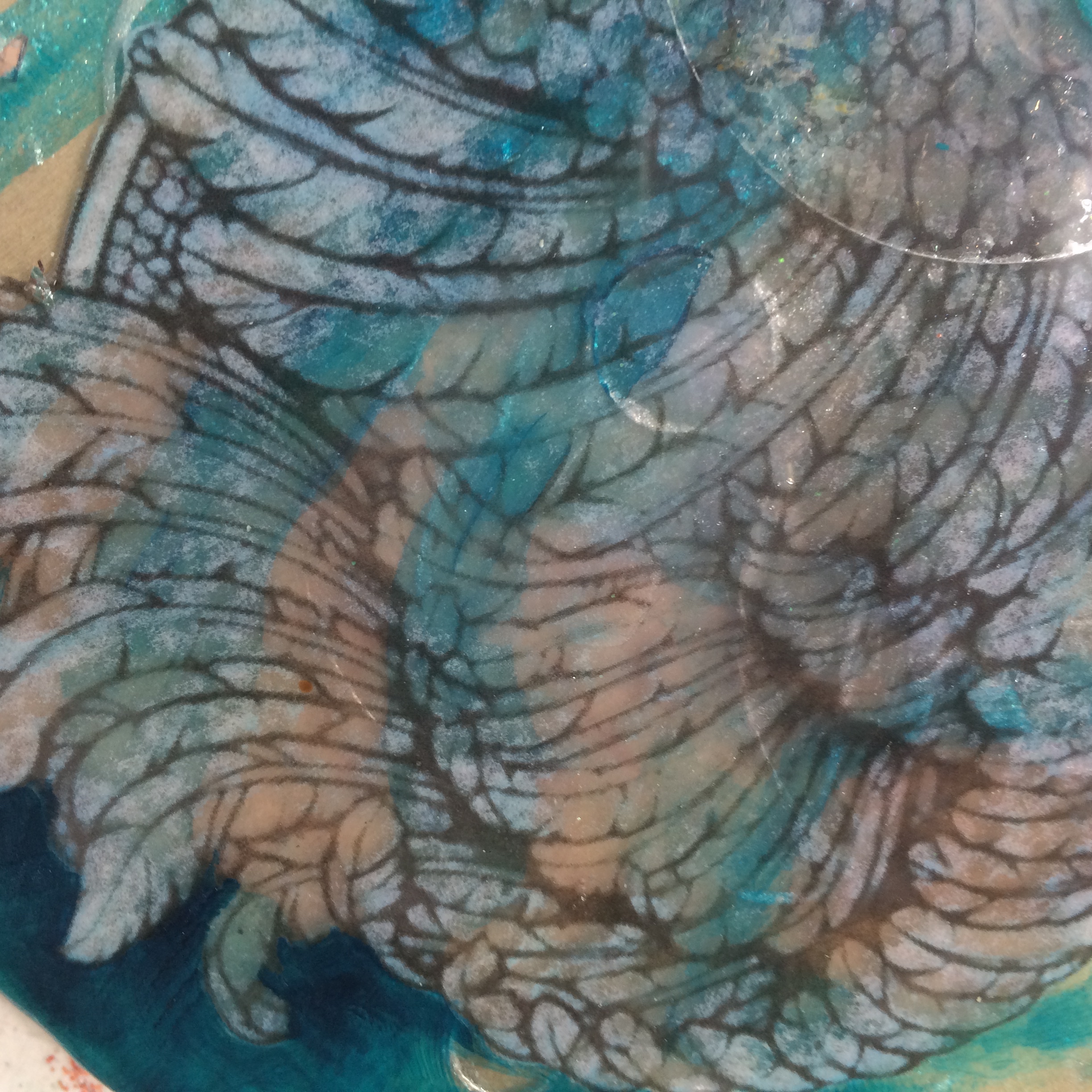 Gel medium transfer wing ball transparent layer. 