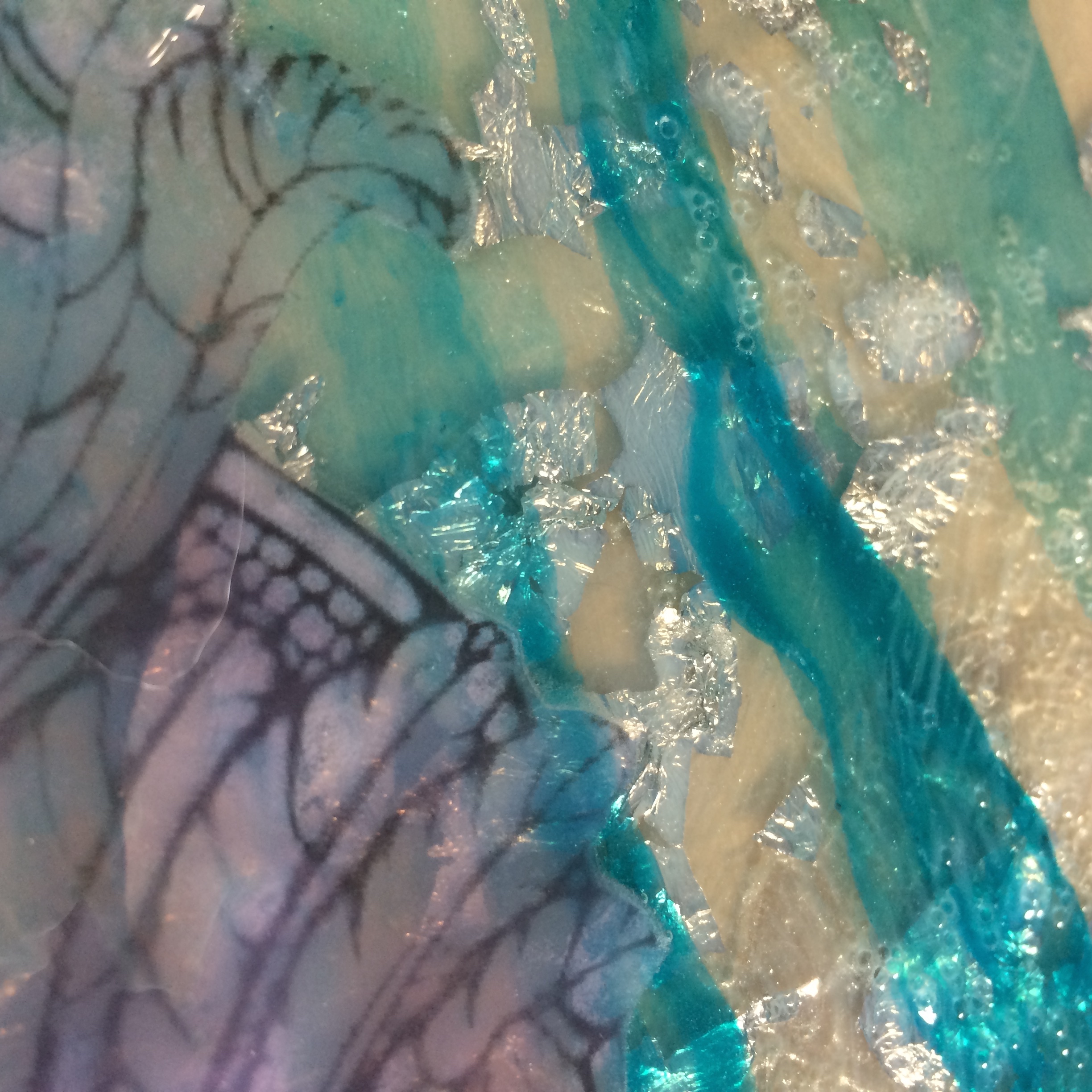 Silver foil under layer. 