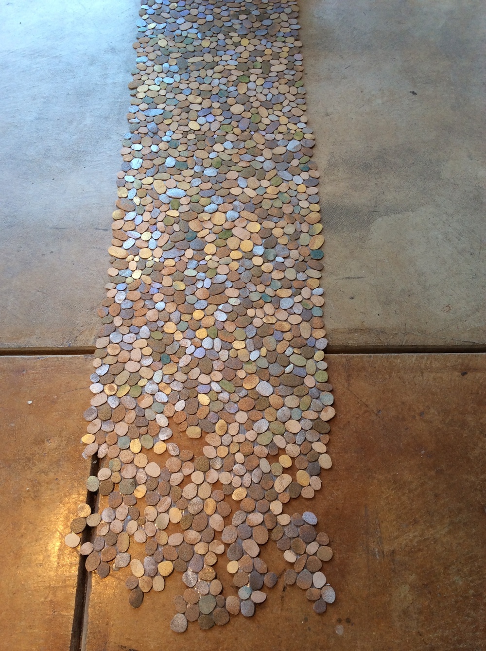  Installation view of cut cork pebbles 