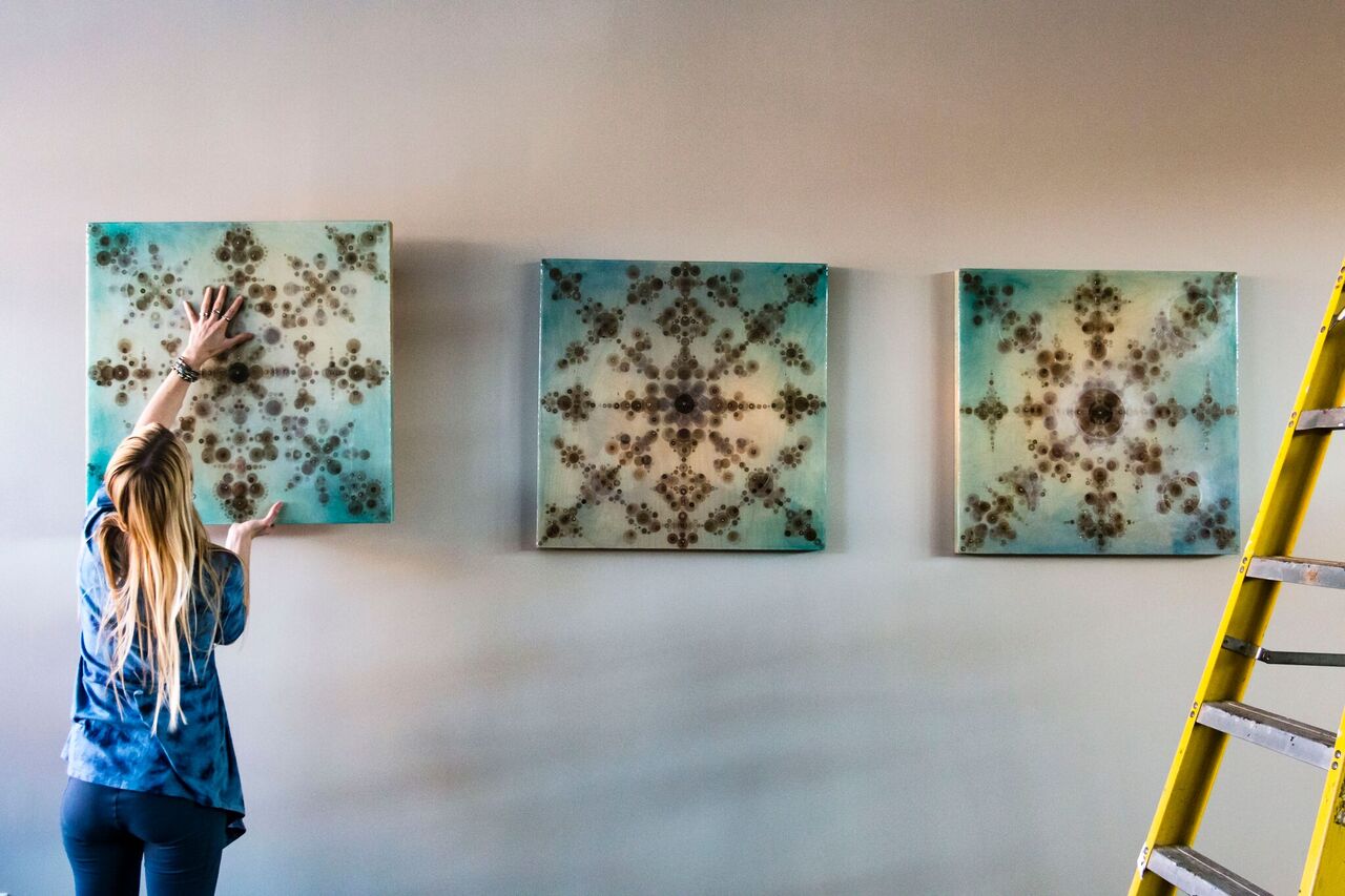 Placing the panels. Photo by Andy Snow .