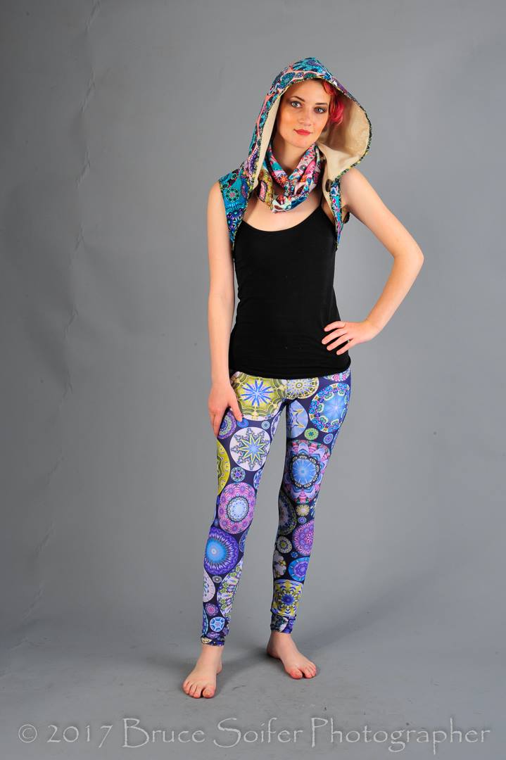 Lilith is wearing my hooded caplet created from several Fancy Floral Kaleidoscope designs in Minky combined with my thrift store gold fabric. She is also sporting a matching infinity scarf and Flower Face Leggings in Vivid Violet!