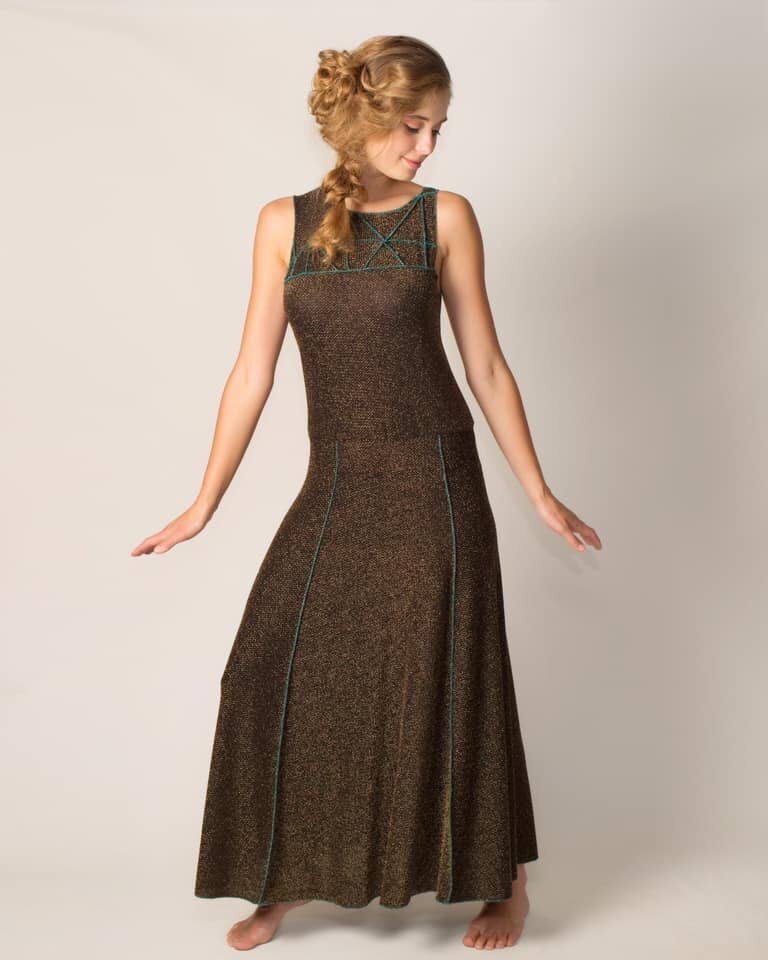 The metallic dress with drop waist and teal stitching. 