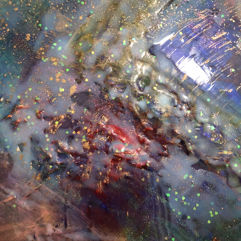 Textures with glitter and pouring medium. 