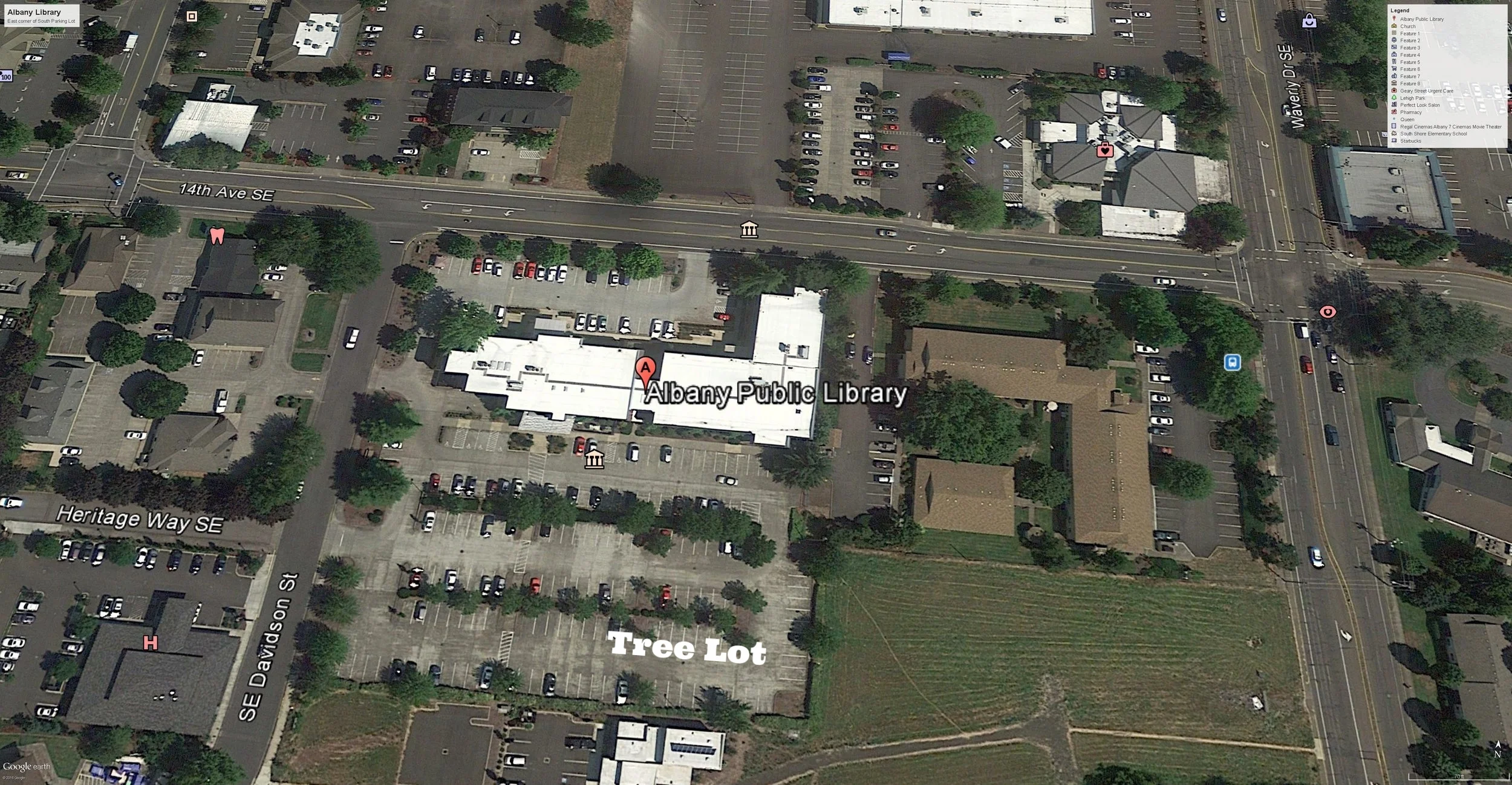 Albany Library (building center). Christmas Tree Lot (bottom center), 14th Ave SE running west (upper left) to east (upper right) and Waverly running north (top right) to south (bottom right). Parking lot entry on Davidson (center left).