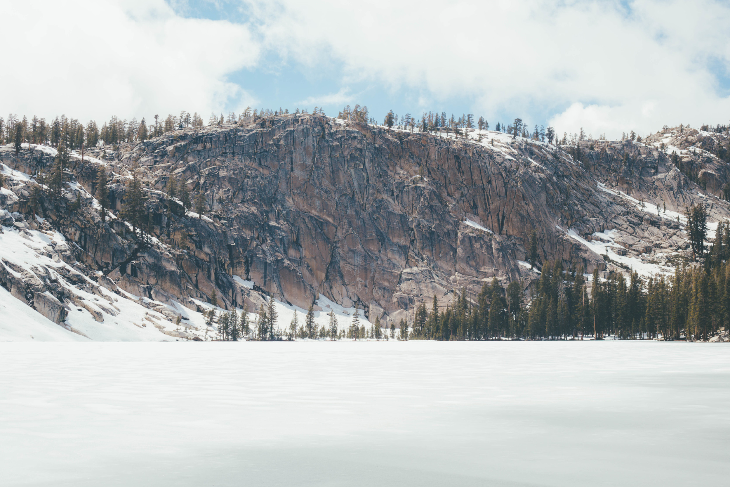 There's a big cliff next to the lake...they must have thought long and hard when they were naming it. 