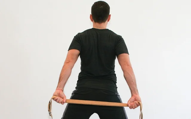 Outer arm bones roll back to open the chest, inner shoulder blades down the back. 