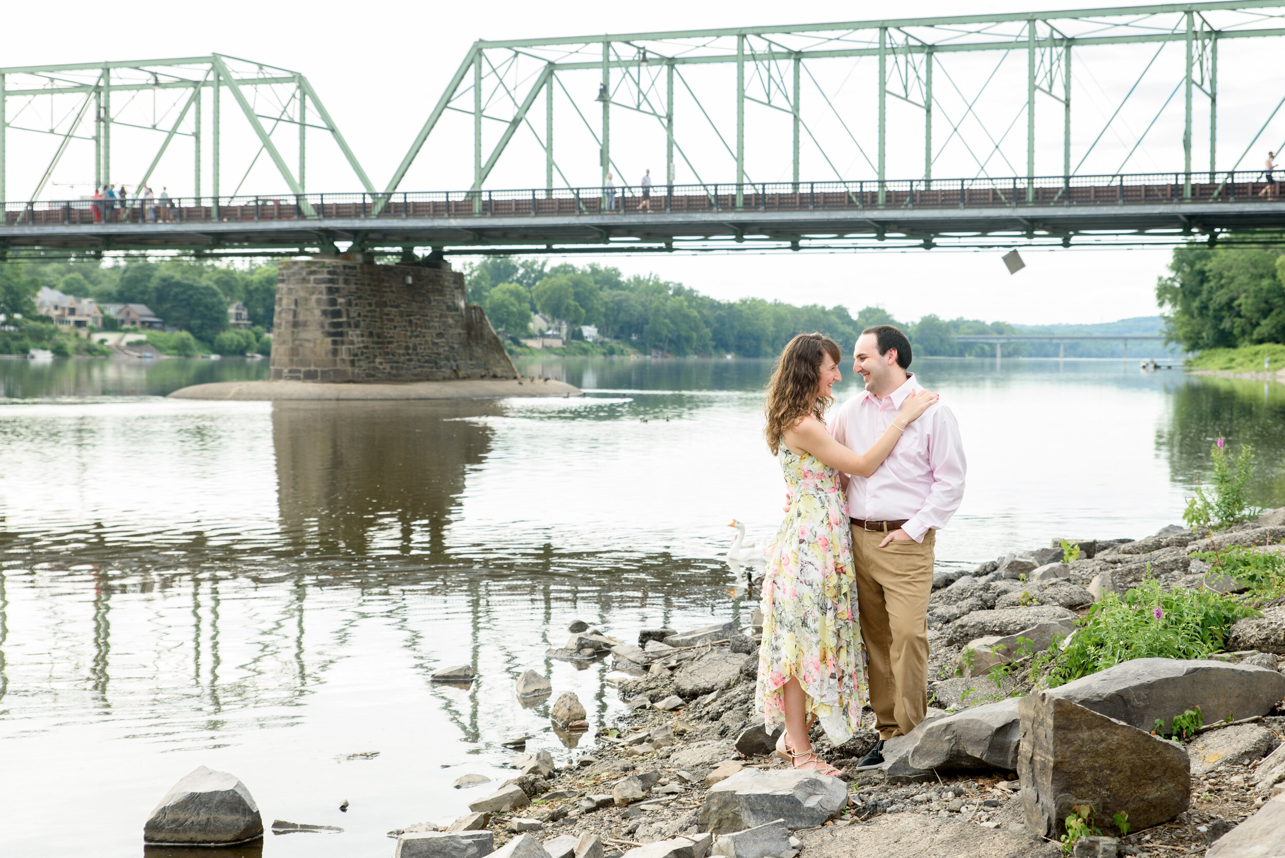 Engagement photos in front of the New Hope-Lambertville bridge