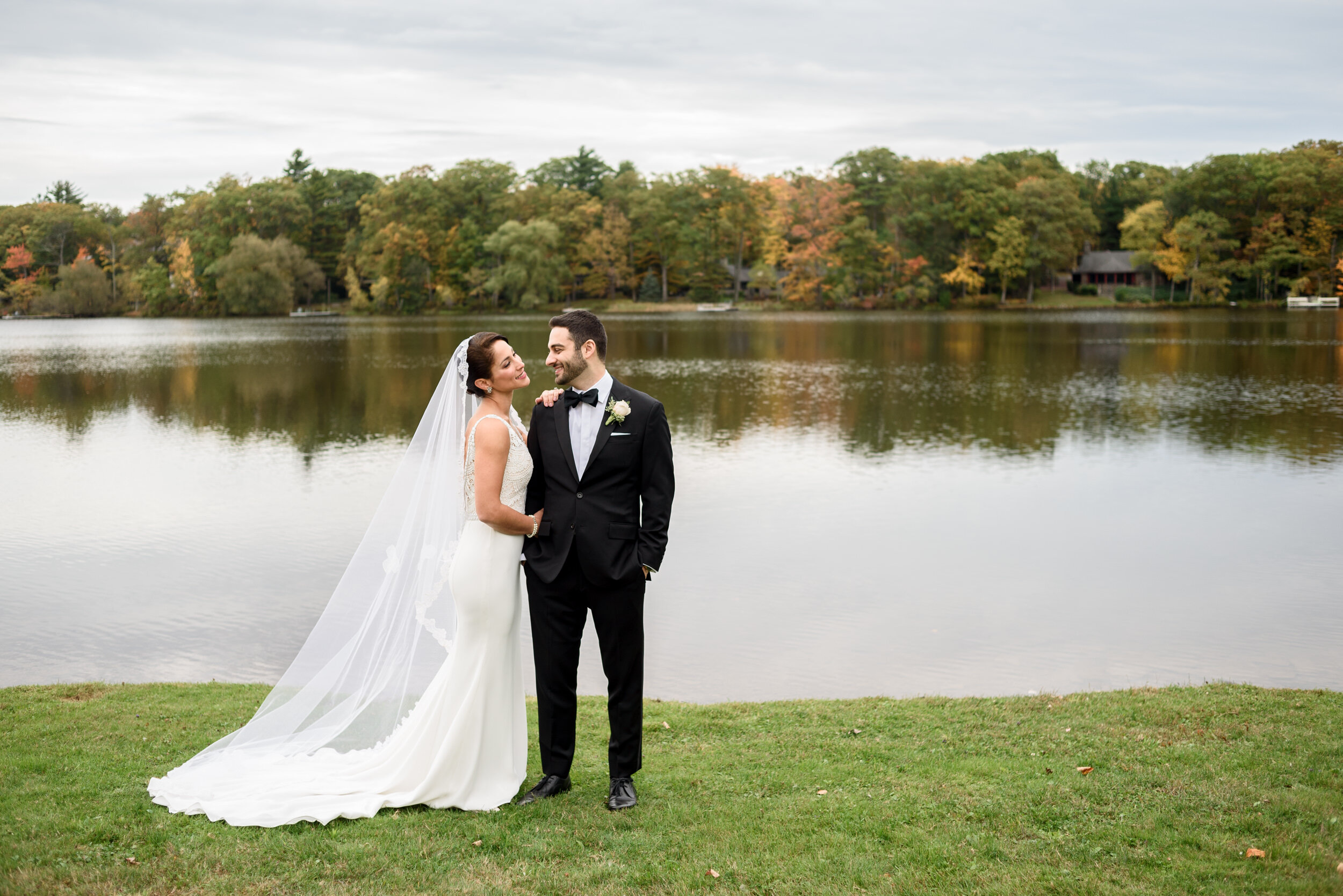 Bride and groom at the lake at Skytop Lodge - Poconos wedding photographer