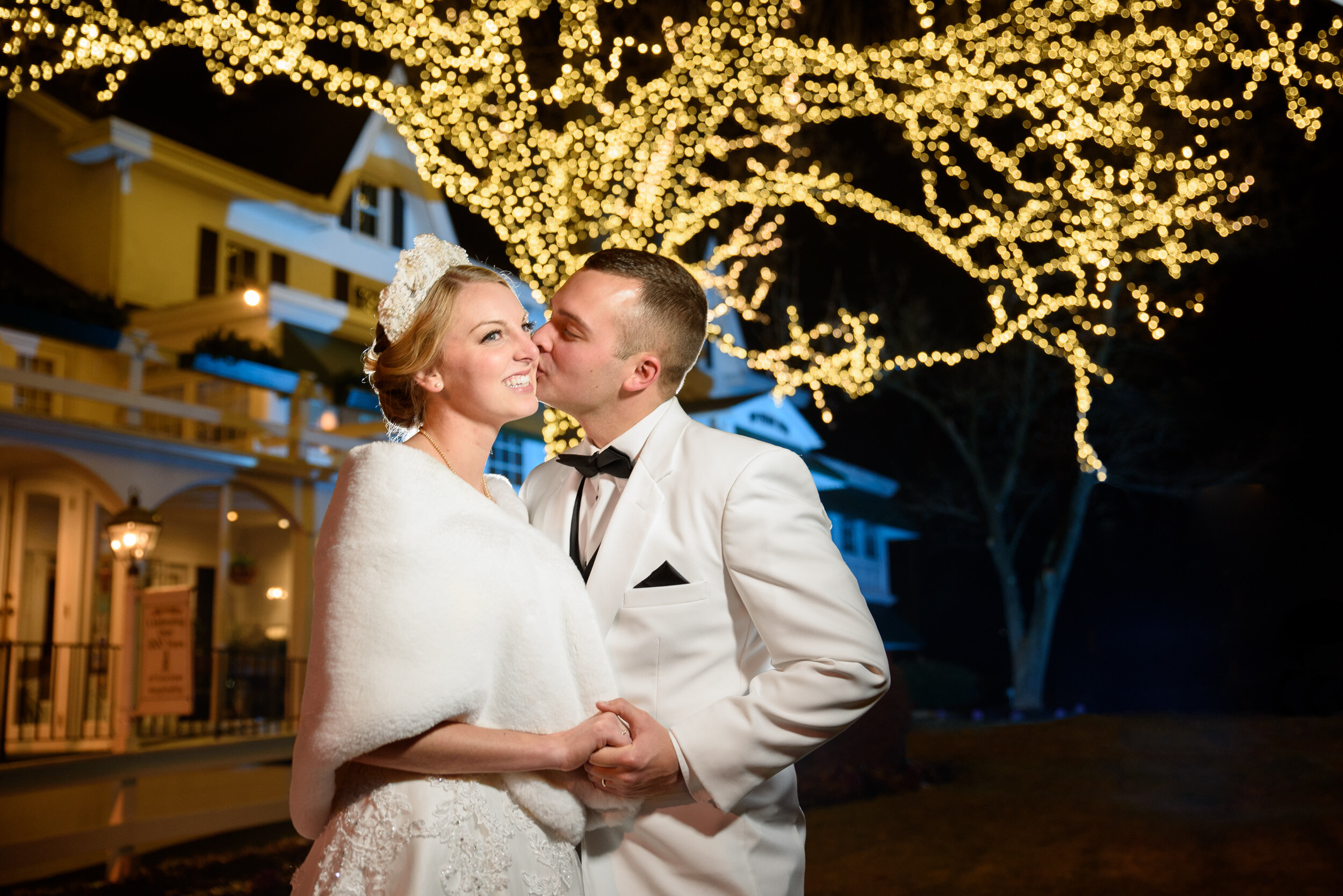 Bride and groom in front of the twinkle lights at William Penn Inn wedding