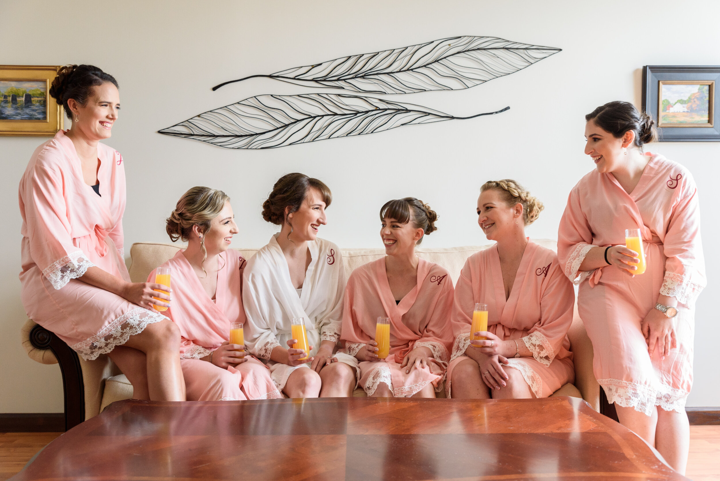 Bride and bridesmaids in bridal suite at Sand Castle Winery