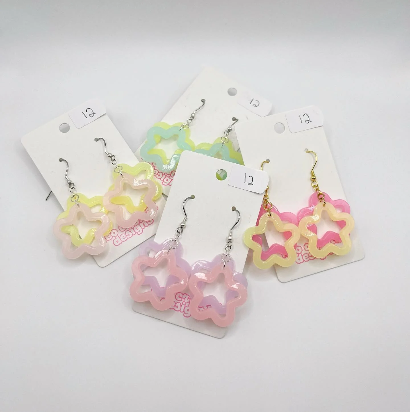 New colors of my acrylic magical girl dangling star earrings up on my shop now!!