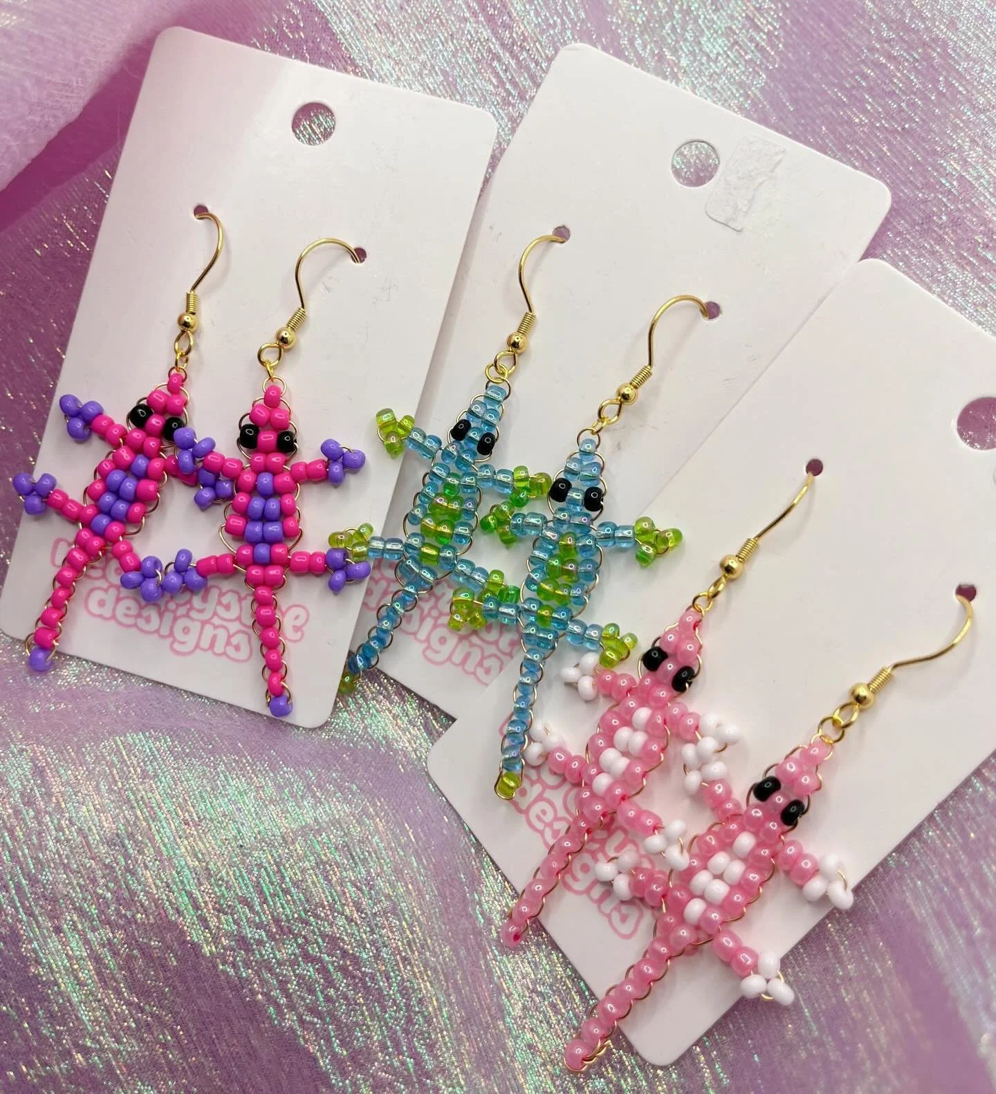 To me, Y2K was making beaded geckos and woven bracelets at Girl Scout camp! I&rsquo;ll be debuting these earrings in February at @teenscenebazaar 💕 which color combo should I try next?