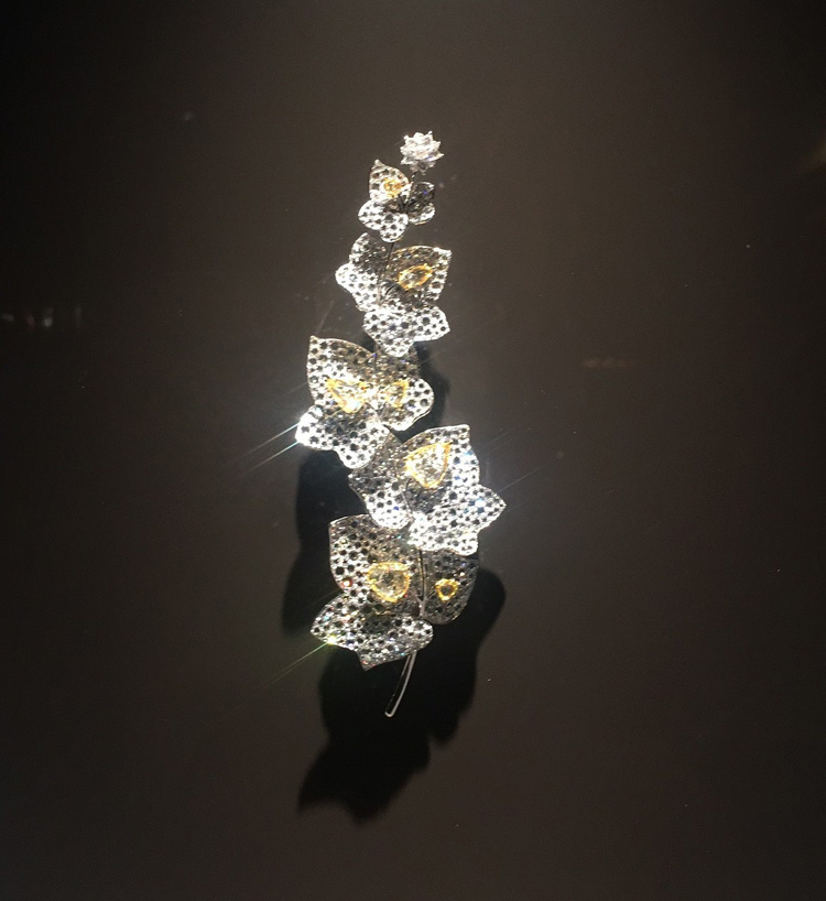 A Fancy Intense Yellow Spray Leaf Brooch by Carnet