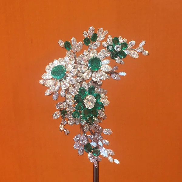 The emerald and diamond flower spray brooch.
