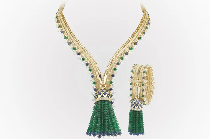 Engineering perfection: Van Cleef and Arpels zip necklace in yellow gold, sapphires, diamonds and emeralds. It can also be worn round the wrist as a bracelet.