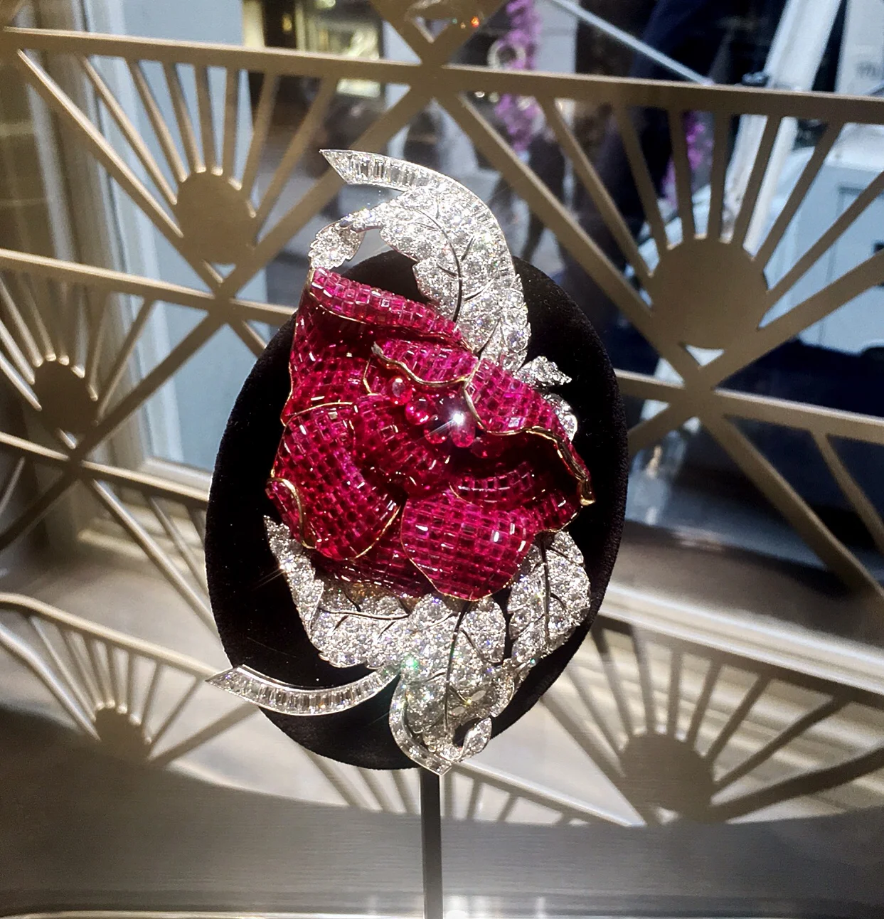 The peony ruby and diamond brooch, a masterclass in invisible setting.