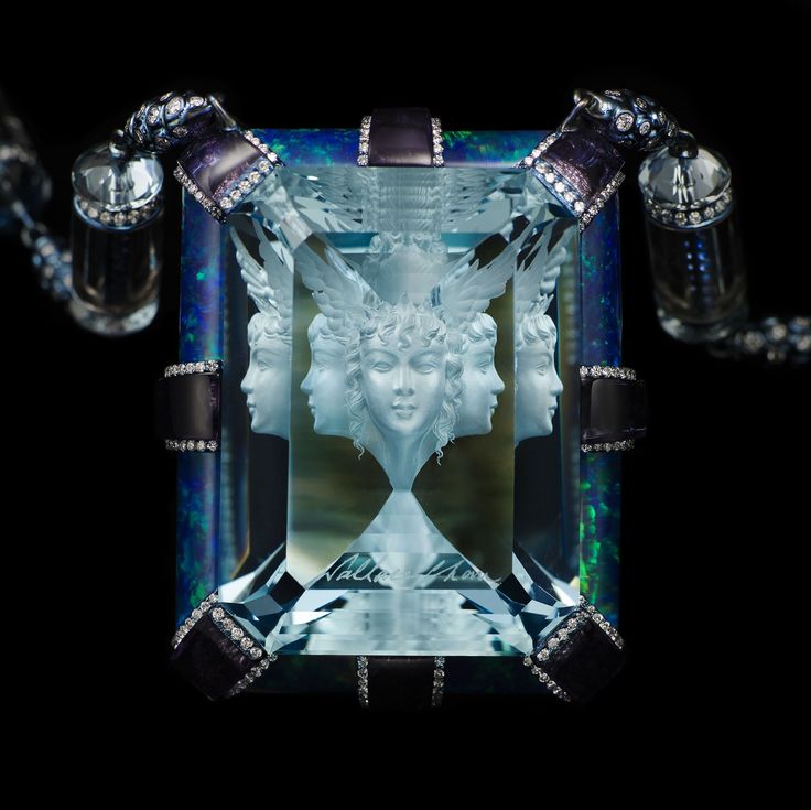 Wallace Chan takes aquamarine carving to a whole new level in this magnificent example. He has made the most of the refractive properties of the stone.