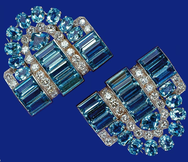 The Cartier clips of Elizabeth II, exhibiting examples of the many ways aquamarine can be cut.