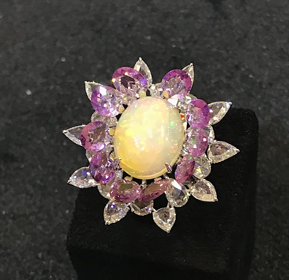 Opal, diamond and pink sapphire ring by VAK diamonds.