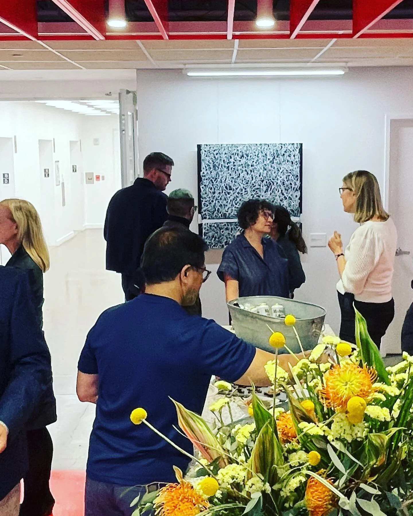 Moment from Thursday&rsquo;s artist reception @genslerbayarea in the back ground is my painting
 &ldquo;Thin White Line- it&rsquo;s Never Just Black &amp; White&rdquo;
36&rdquo; x 36&rdquo; 
Oil pain graphite canvas 
Thinking about one of the  questi