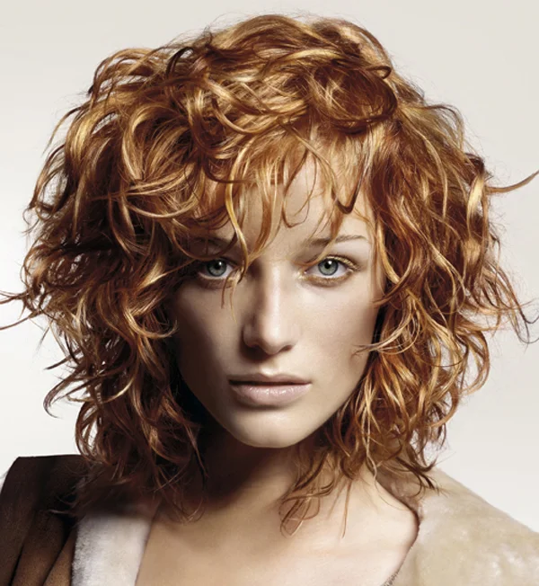 curly-hairstyles-for-short-hair-with-heavy-side-swept-bangs-and-layers600-x-652-364-kb-jpeg-x.jpg