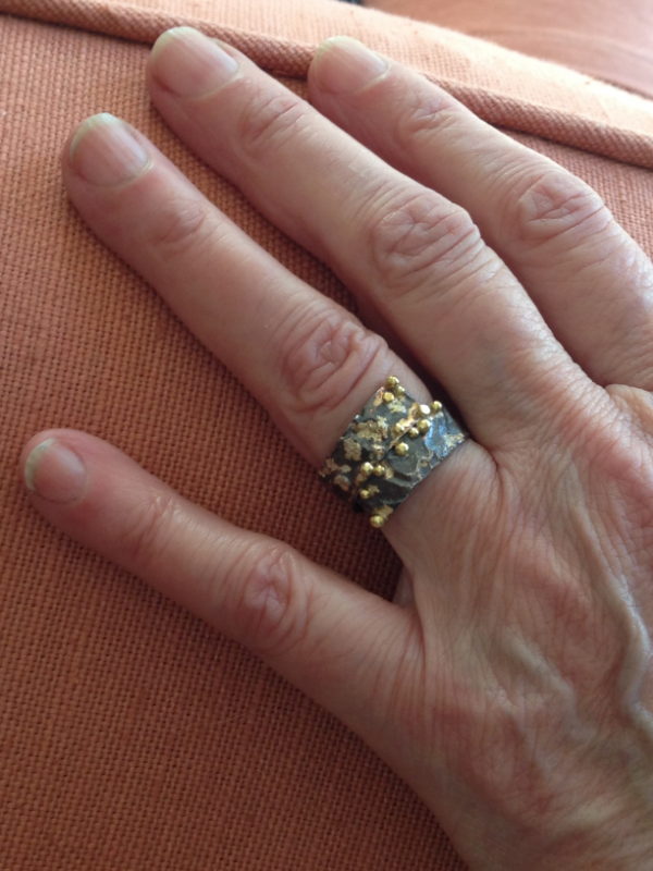 This is the lovely hand of Cynthia who was a pleasure to create this ring for.