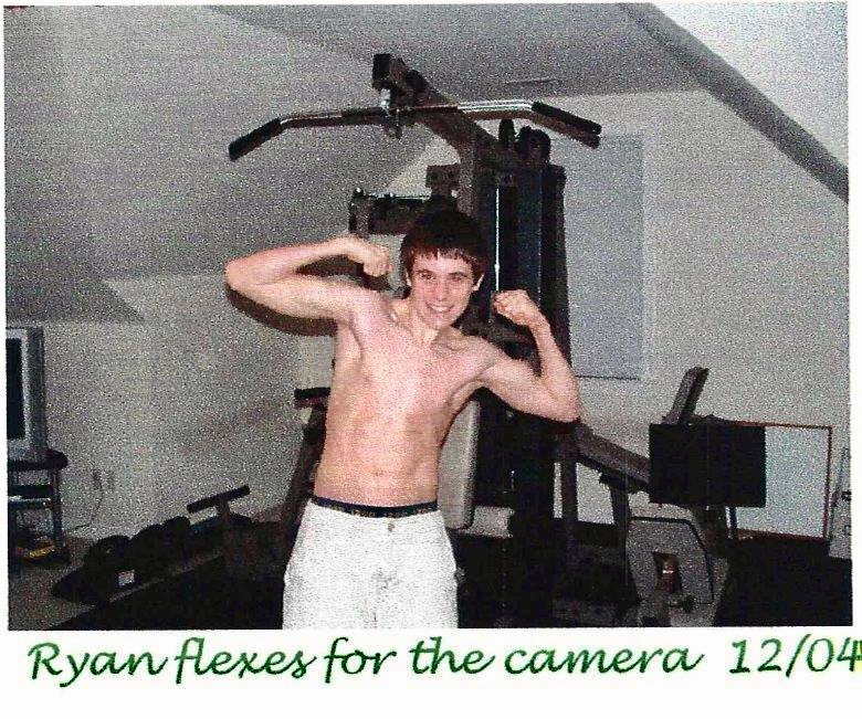 Me, in all my gooberosity, posing in front of the very machine which yielded such a physique. Scanned from the 2004 edition of our annual family Christmas Letter