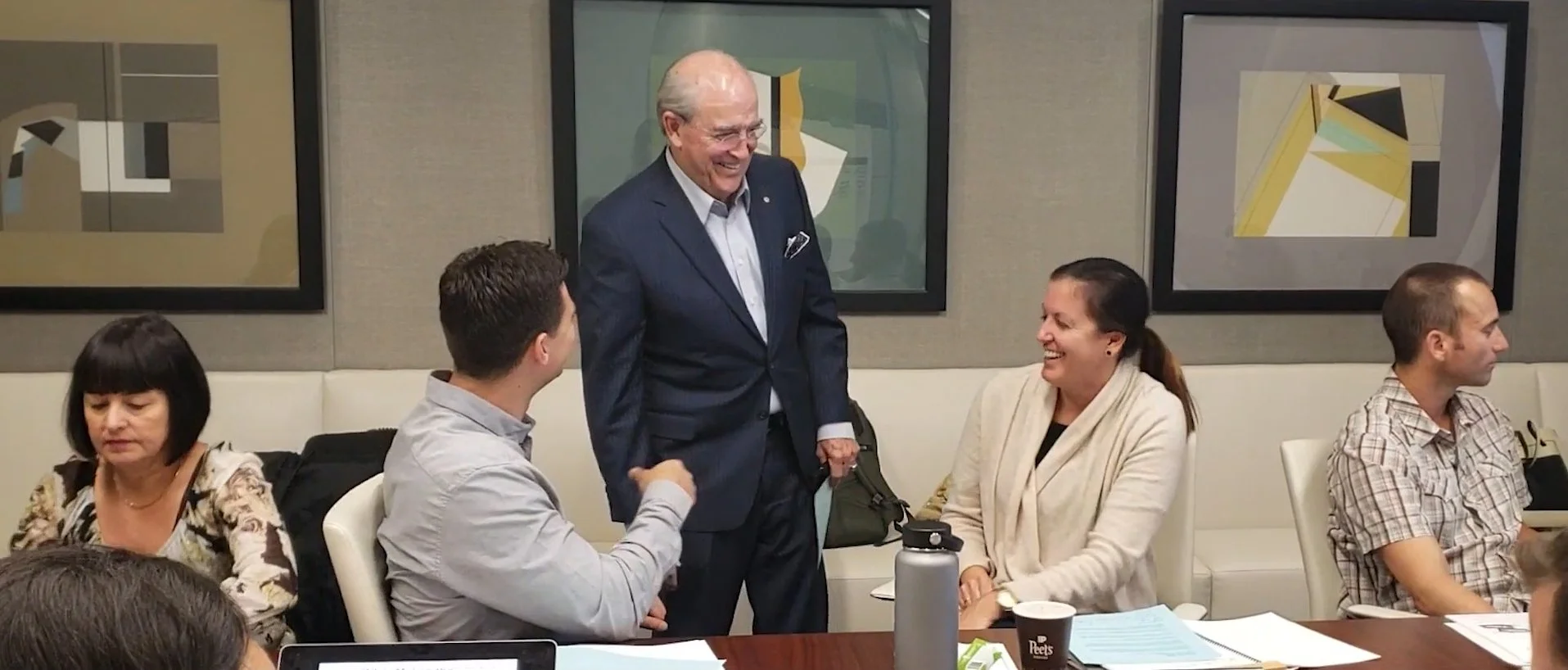 bob-gibson-in-training-session-negotiating-wisdom-laughing-wish-participants.jpg