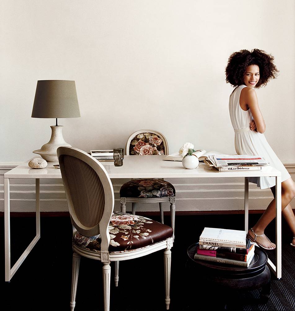 In this editorial spread by Dara Caponigro for Domino chintz accents and clean lines makes the room feel bright and fresh.