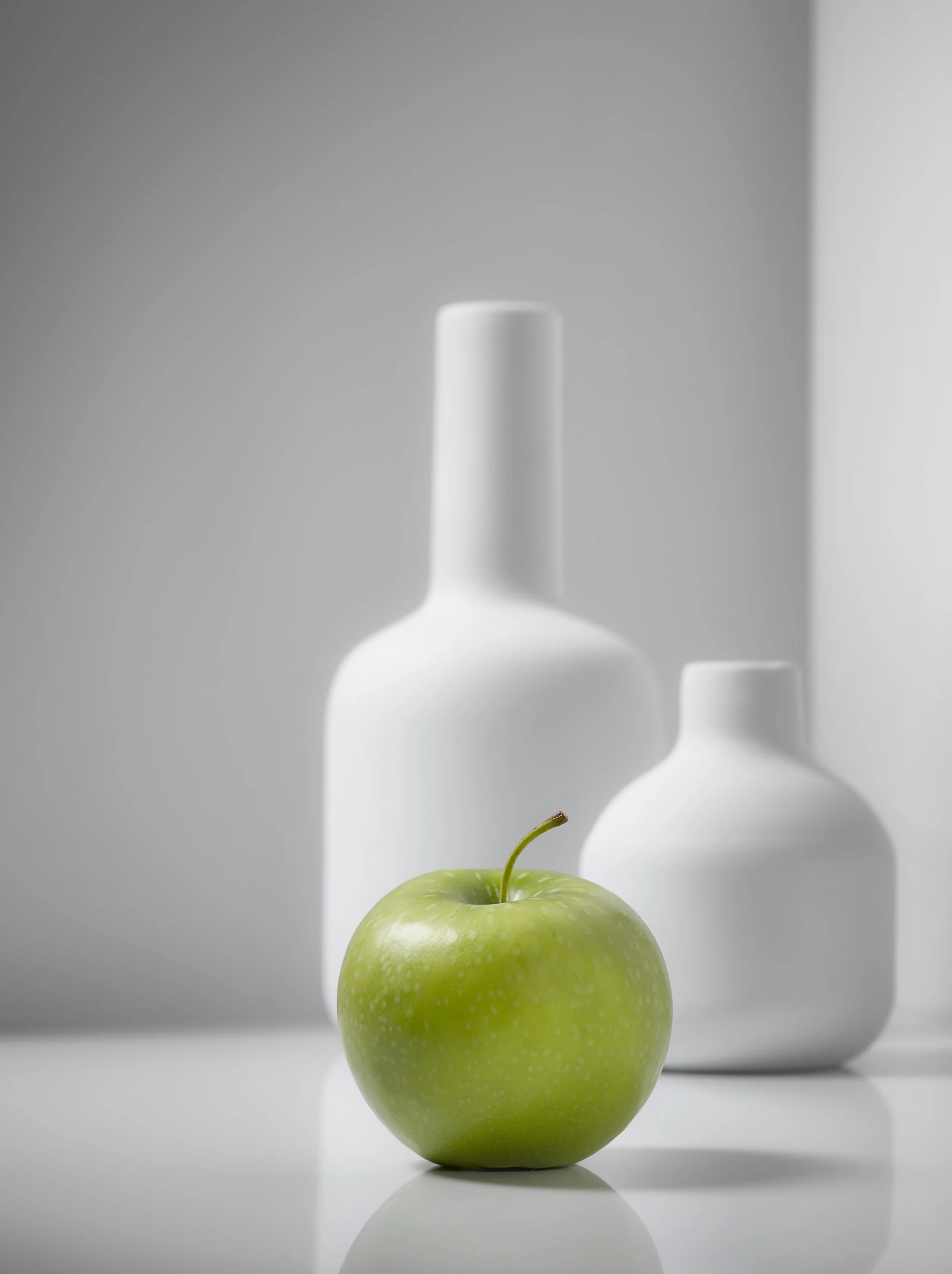 16_White vessels with apple.jpg