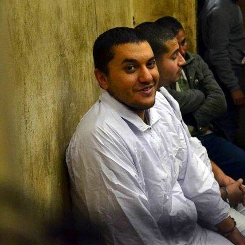Omar Hazek, in white. Image courtesy of Arablit.org. 