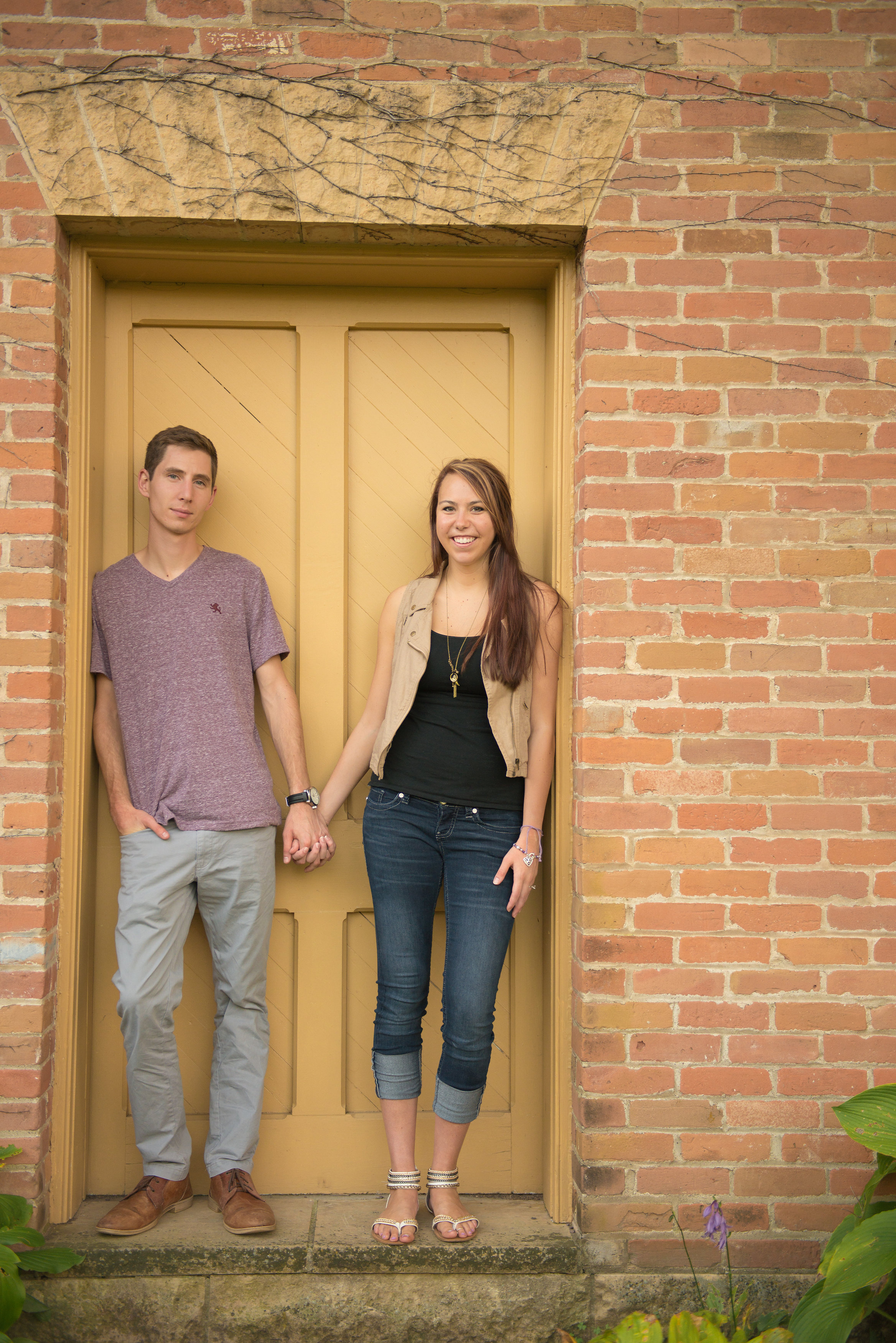 Orlando-couple-holding-hands-door.jpg