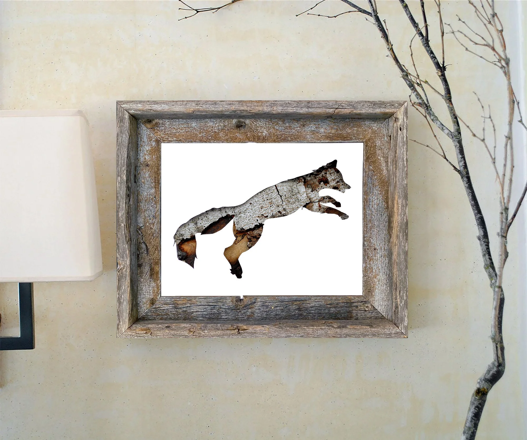 Framed red fox bark art print displayed in a rustic wood frame against a light wall with natural branches.