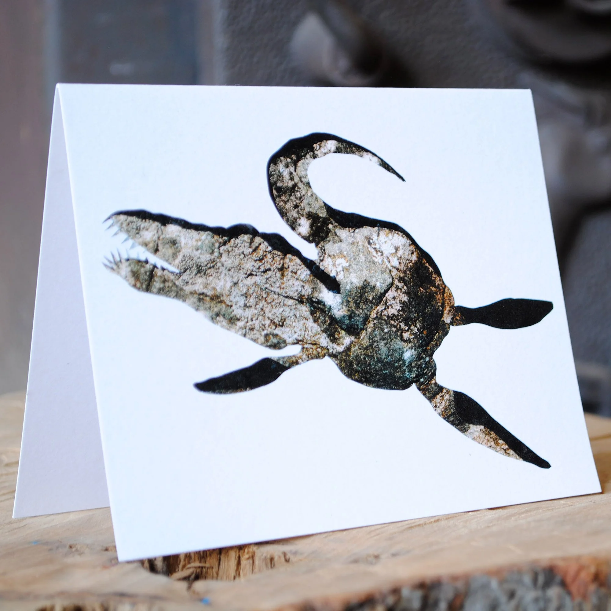 Liopleurodon dinosaur blank note card illustrated in stone textures, eco-friendly kids thank you stationery.