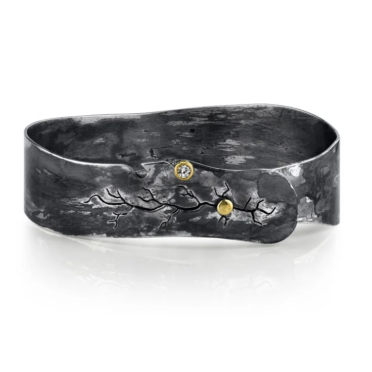 Organic Silver Cuff Bracelet, accented with a Diamond set in 18 Karat Yellow Gold