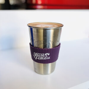 Customers who would like an espresso drink in their personal mug will have their drink made in a reusable stainless steel pint cup with sleeve, which can then be poured into their personal mug.