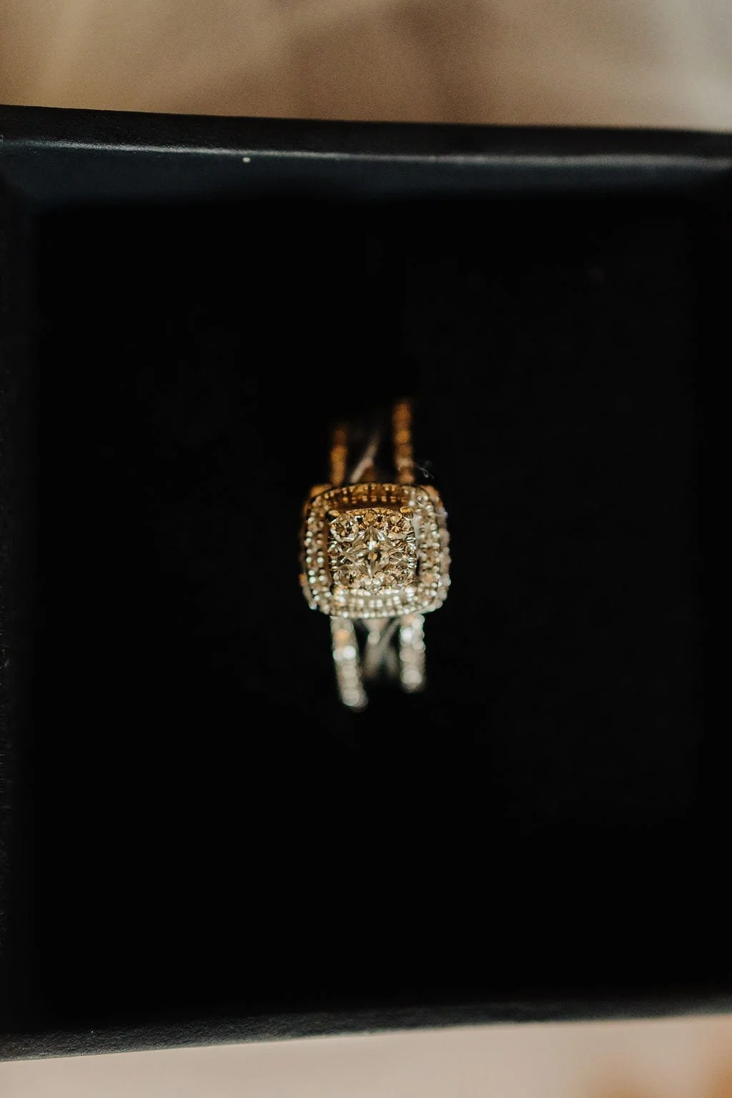 Close-up of Kristie and Gillon’s wedding rings before their wedding ceremony.