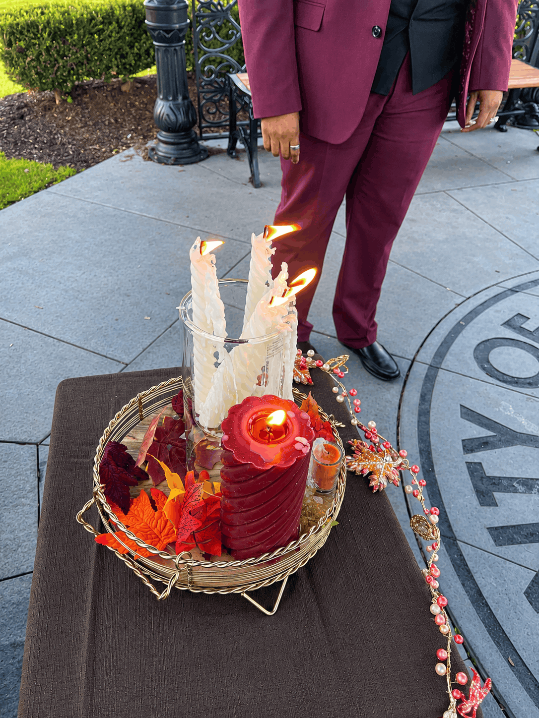 Lit unity candle symbolizing the joining of Tiffany and Tanell’s family during their intimate wedding ceremony at Eagle Rock Reservation in West Orange, NJ.