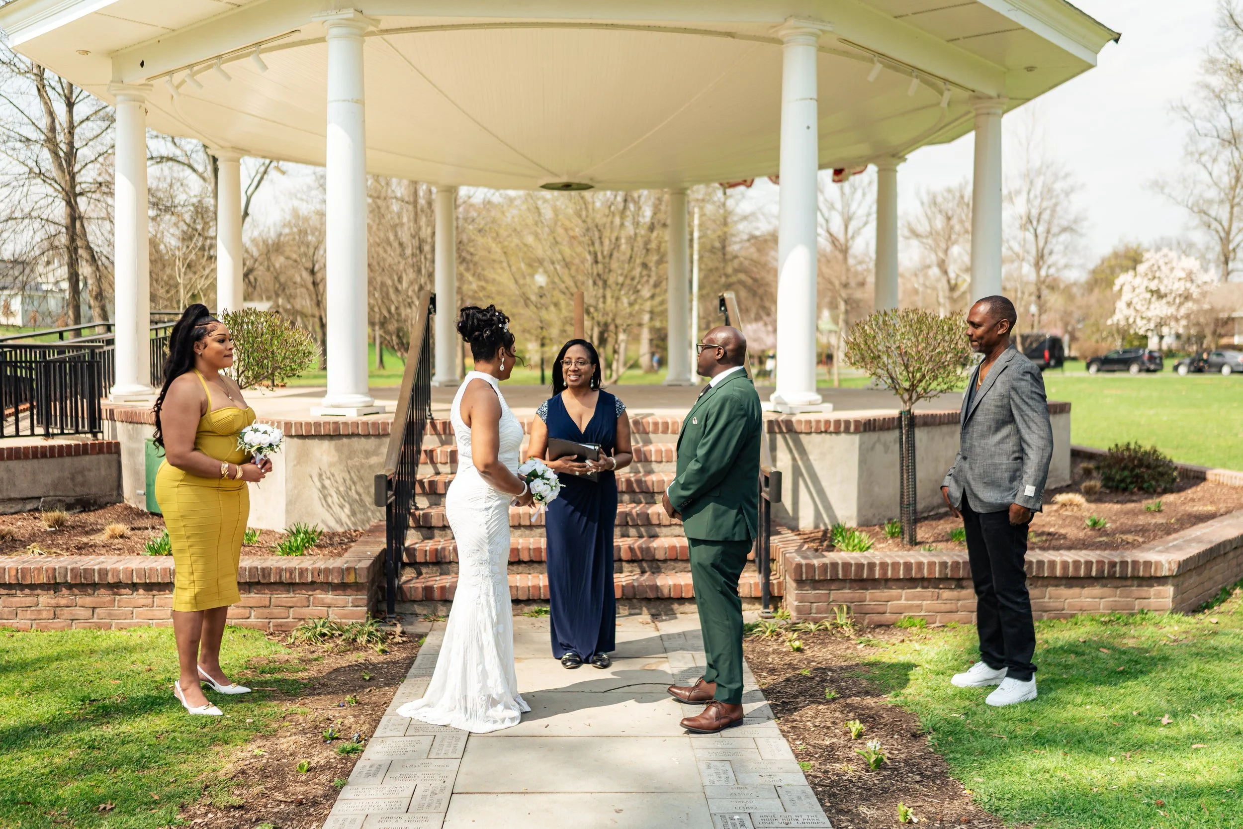 Intimate elopement ceremony taking place at the gazebo in Mindowaskin Park in Westfield, New Jersey