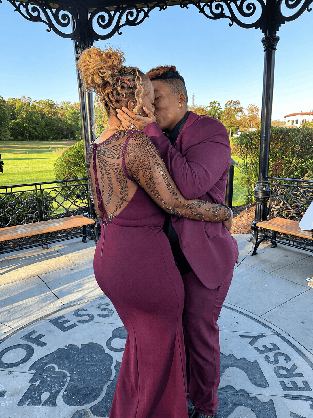 Tiffany and Tanell sharing a kiss beneath the gazebo at Eagle Rock Reservation in West Orange, NJ during their intimate wedding.