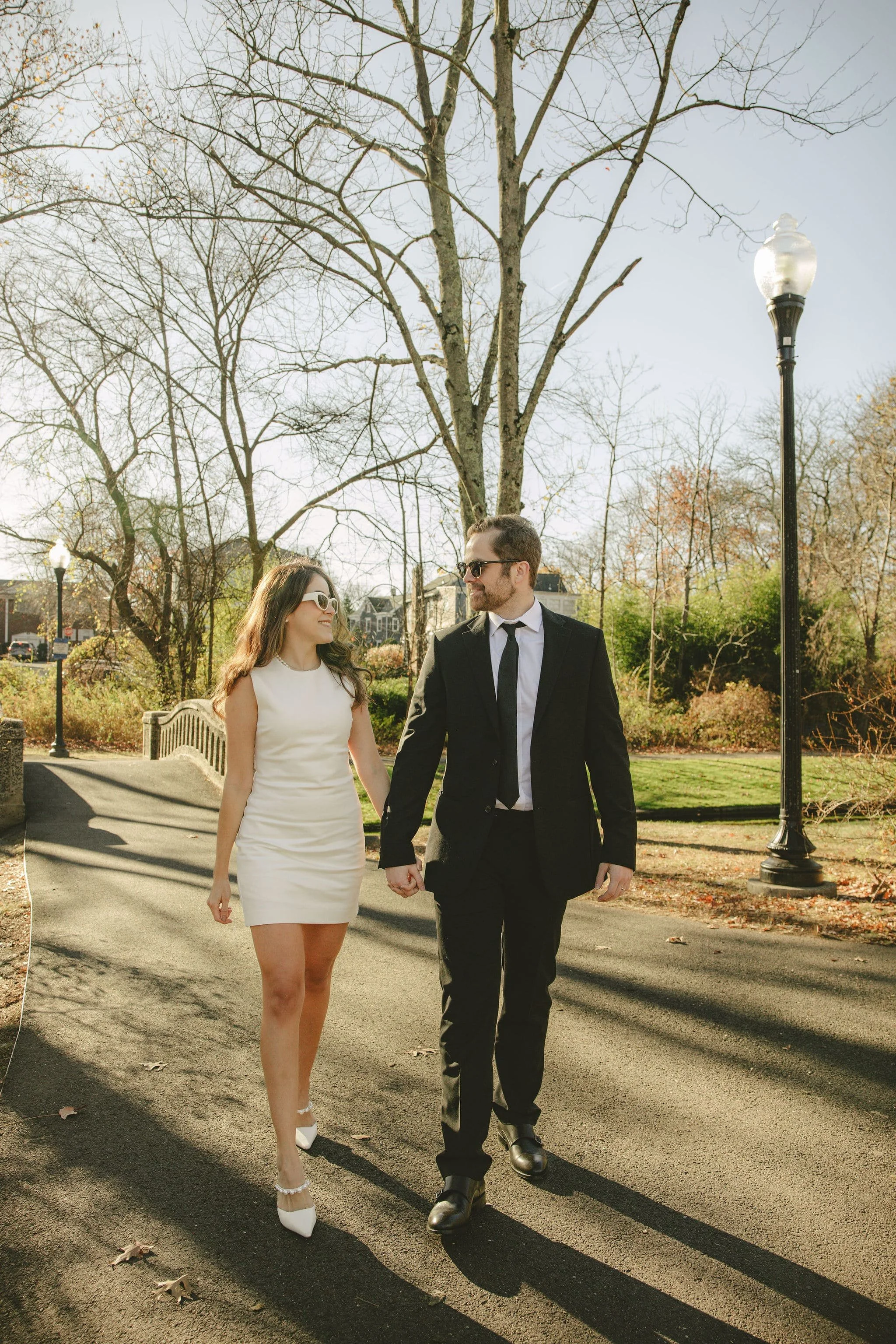 Couple walking together after an intimate outdoor elopement in Monmouth County, New Jersey, officiated by a local elopement officiant